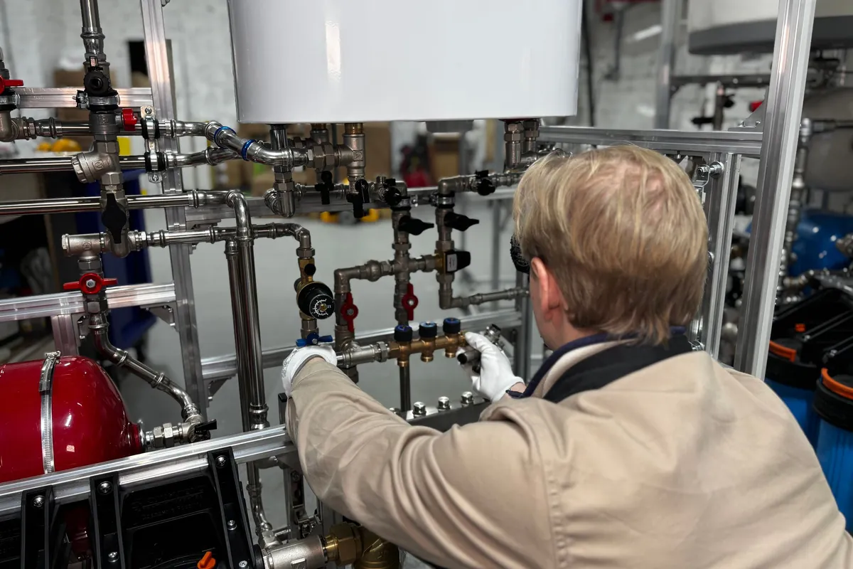 Engineer at the boiler pipework