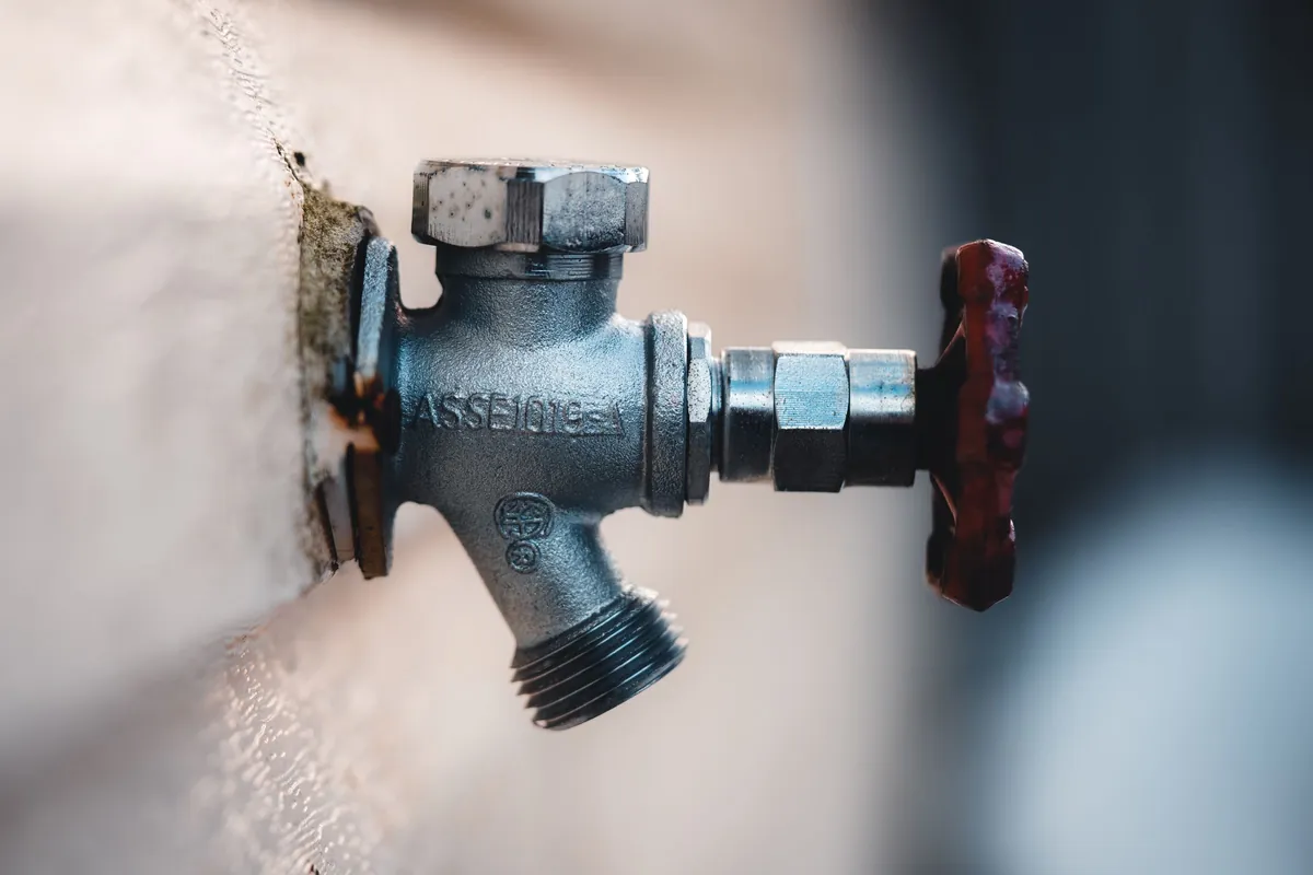Outside tap and isolation valve