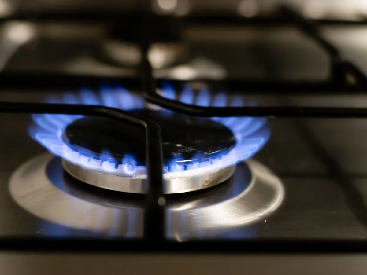 Blue flame on a gas hob burner