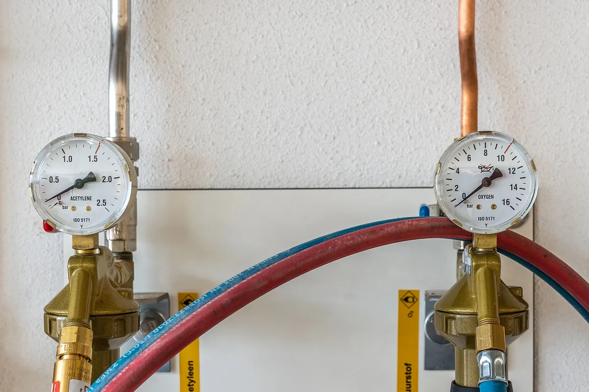 Pressure test gauges connected to pipework